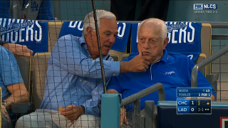 Here's Bobby Valentine Lovingly Wiping Crumbs Off Tommy Lasorda's Mouth
